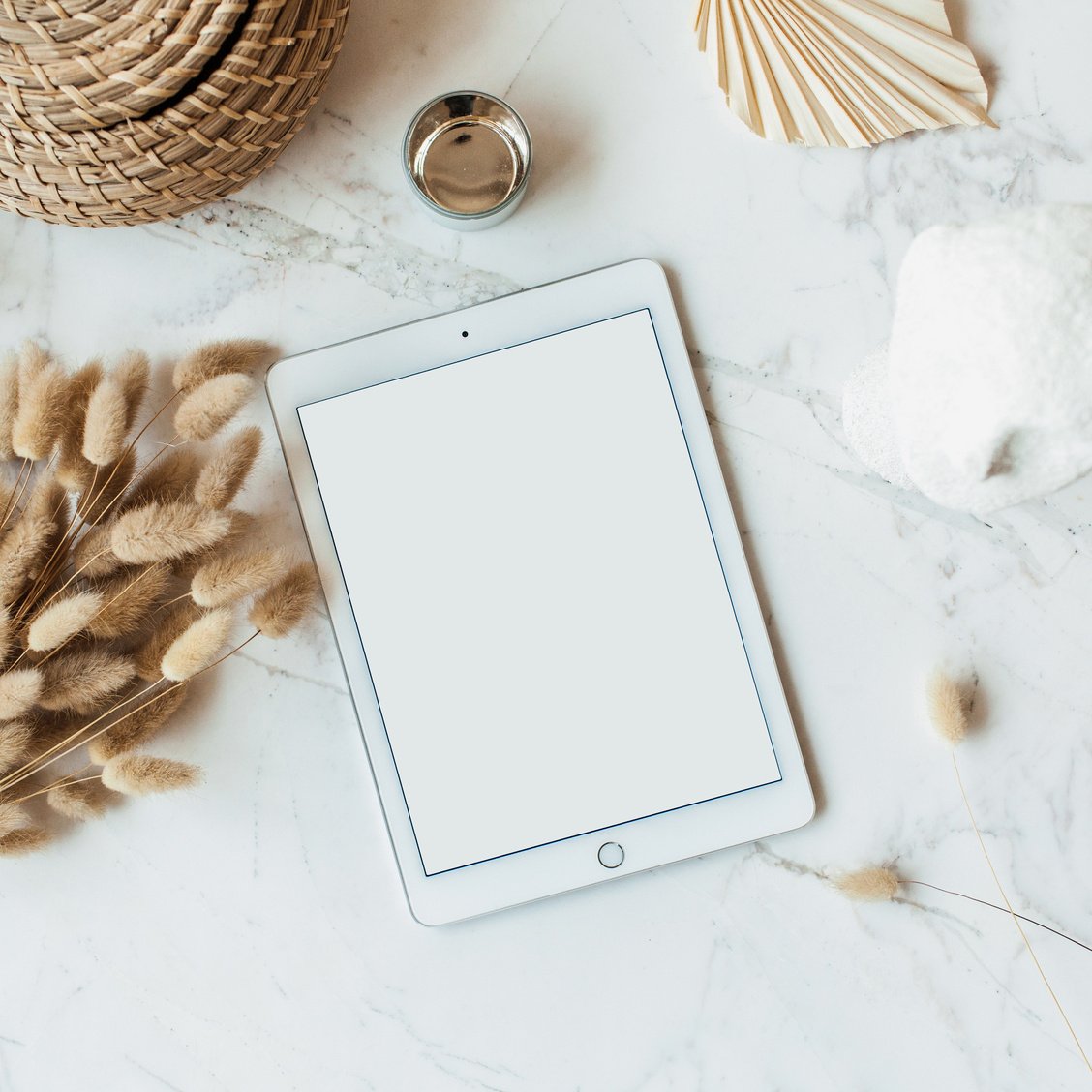 Blank Digital Tablet Mockup on Decorated White Marble Table